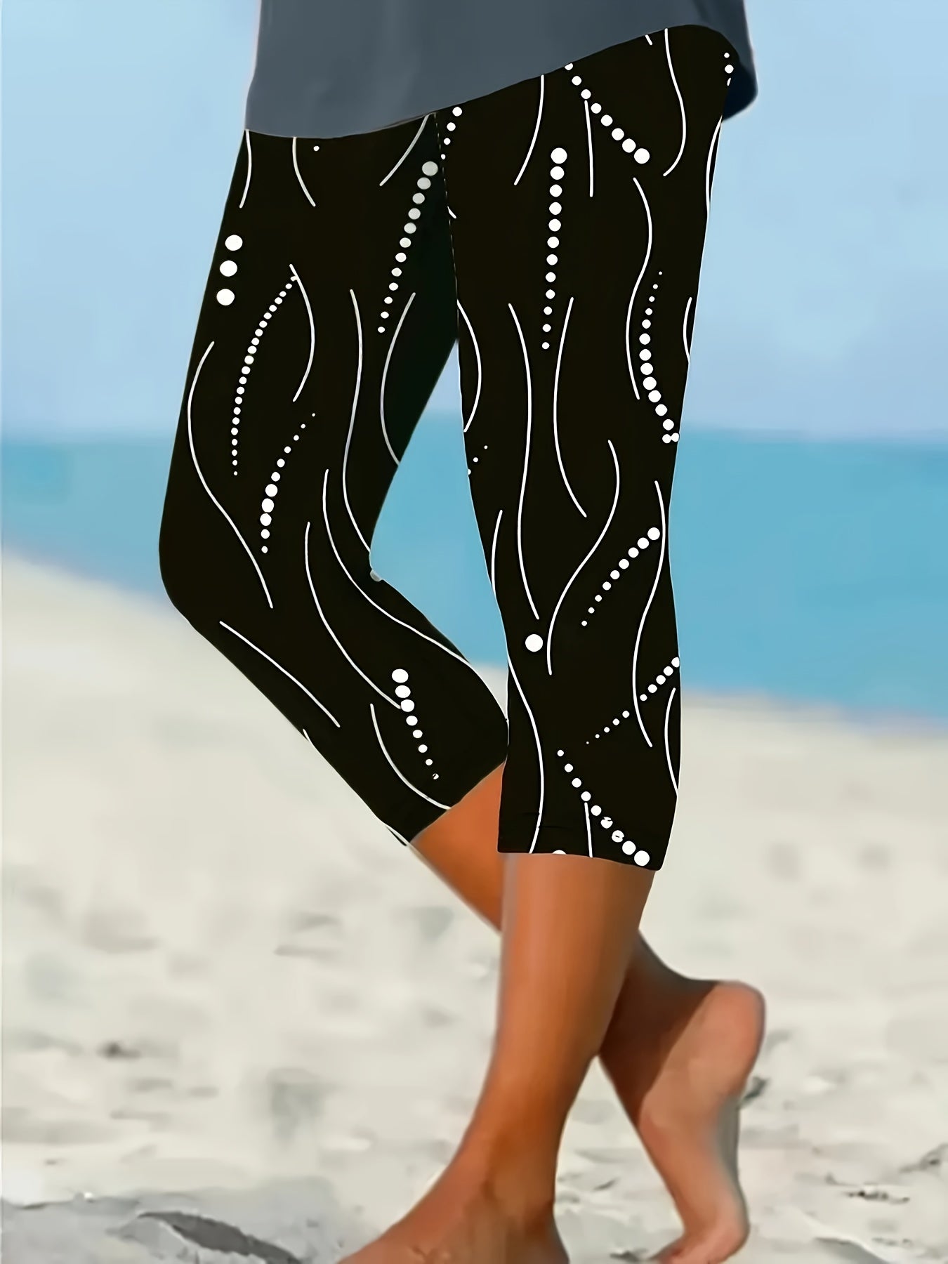 Women's Black and White Abstract Print Leggings with High Waist and Stretchy Fabric