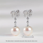 Women's Silver Earrings with Natural Freshwater Pearls and Bow Design
