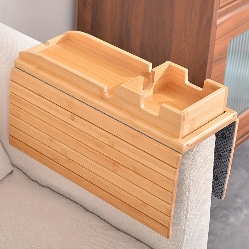 Divaningiz uchun foydalanish oson bo'lgan stakan ushlagich. Qo'ltiq panjasi qulay tarzda yig'iladi va ichimliklar, mobil telefonlar, masofadan boshqarish pultlari yoki atıştırmalıklar saqlash uchun juda mos keladi.