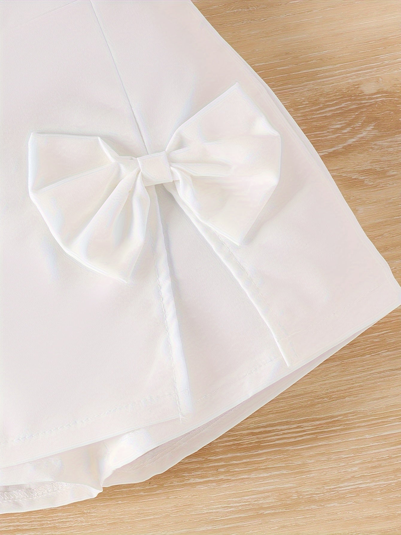 Летний комплект для девочек с розовым топом и юбкой с бантом для повседневной носки