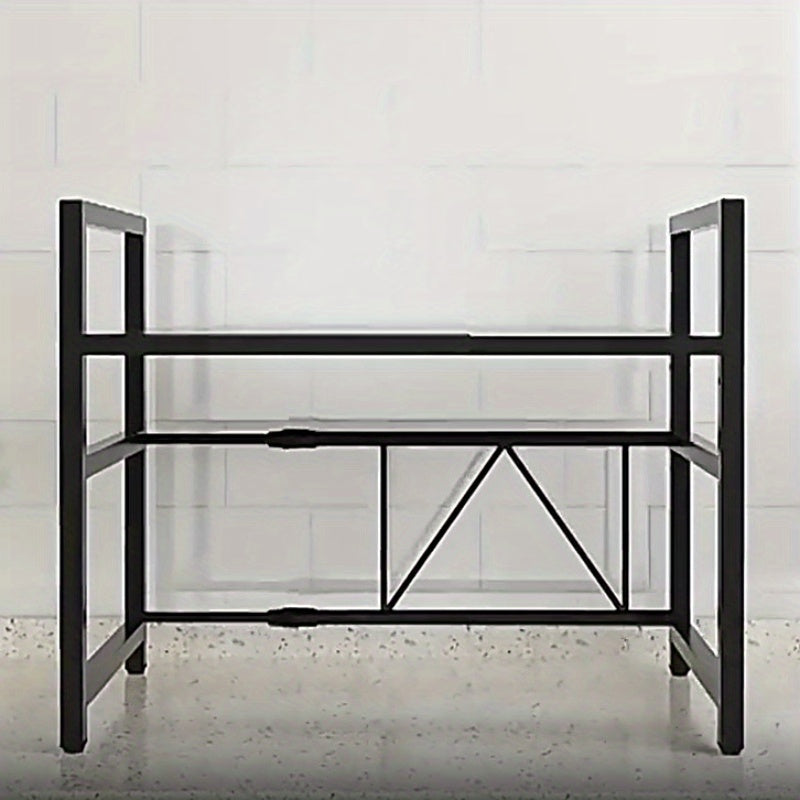 Kengaytiriladigan 2-qavatli metall stol usti pech qismi, qora karbon po'latdan tayyorlangan va oson harakat uchun g'ildiraklar bilan. Mikrotolqinli pech, idish-tovoq va oshxona muhim buyumlarini tartibga solish uchun ideal.