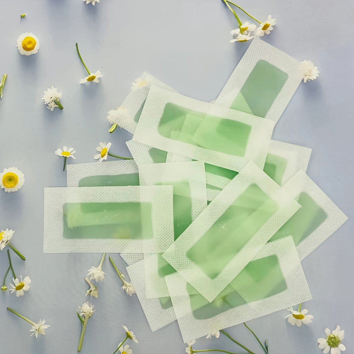 30 ta ikki tomonlama soch olib tashlash mumli lentalar, barcha teri turlari uchun, aloe ta'mida yashil, yuz va tana sochlarini olib tashlash uchun tayyor. Har qanday o'lchamga kesilishi mumkin.