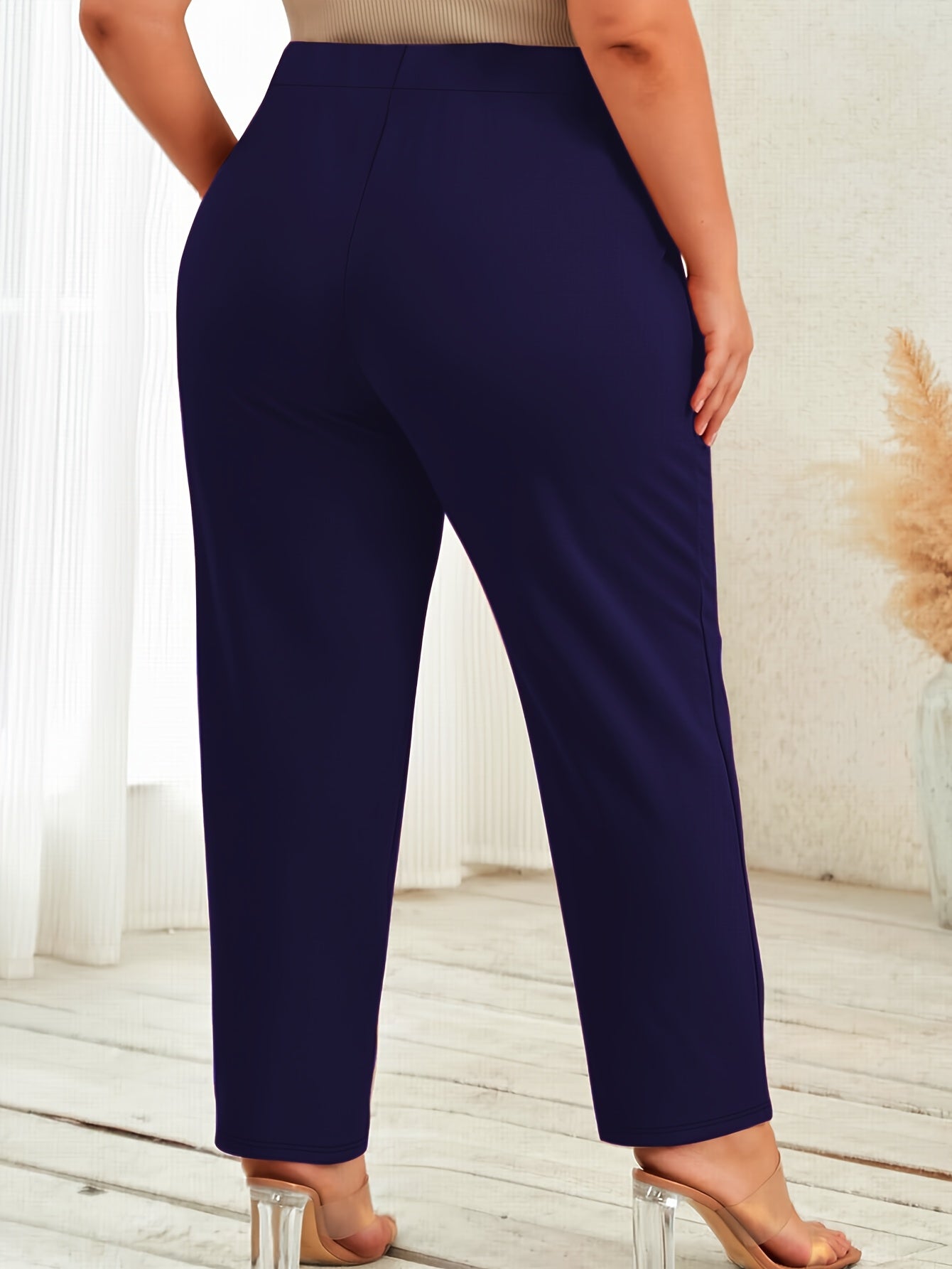 Pantalones rectos de talla grande de color sólido con tela elástica para mujer