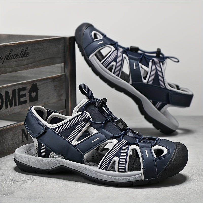 Barmoqni yopadigan erkaklar sandallari, tasmali, nafas oladigan, sirpanmaydigan kauchuk taglik, yozda plyaj va suv faoliyatlari uchun chidamli.