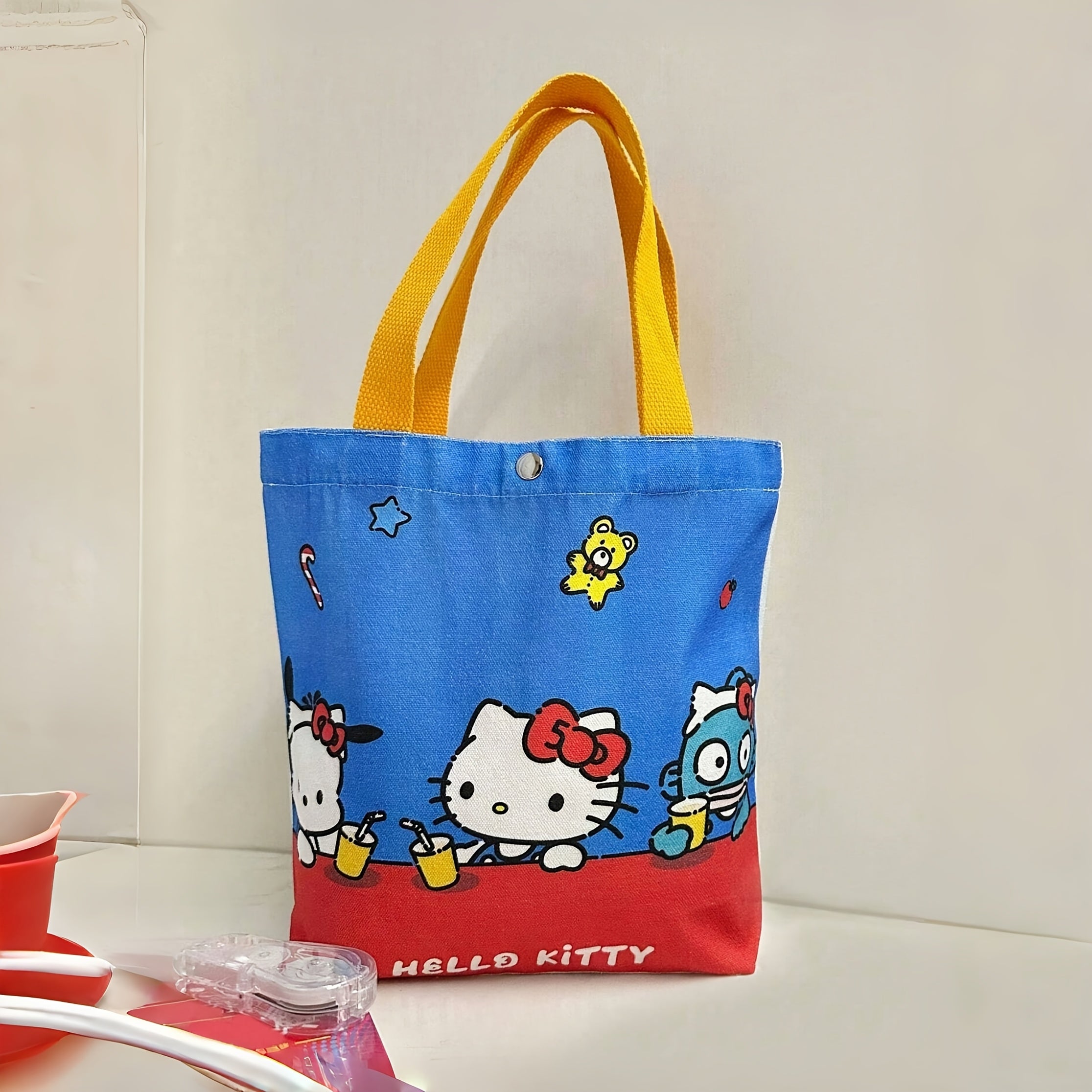 Hello Kitty Animal Print Canvas Travel Bag with Tassel and Buckle Closure