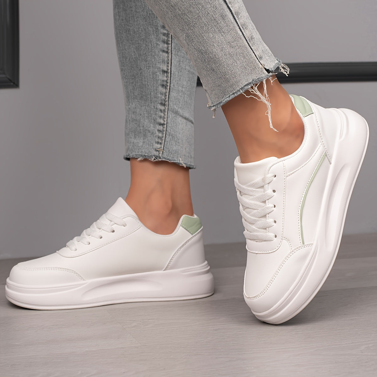 Women's White Low Top Skate Shoes with Round Toe and Lace-Up Closure