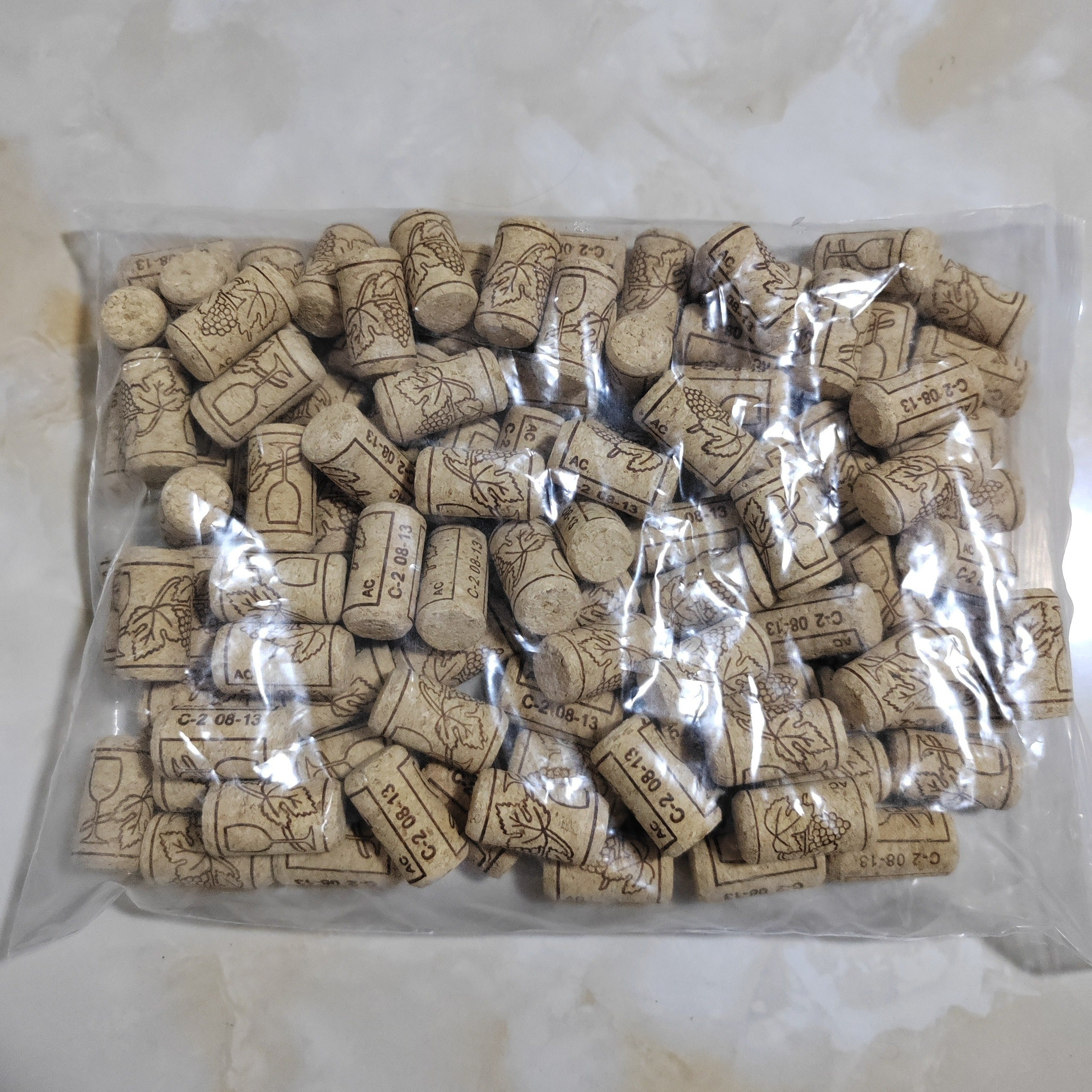 Natural Wine Corks Set of 100 with Engraved Designs for Sealing and Preservation