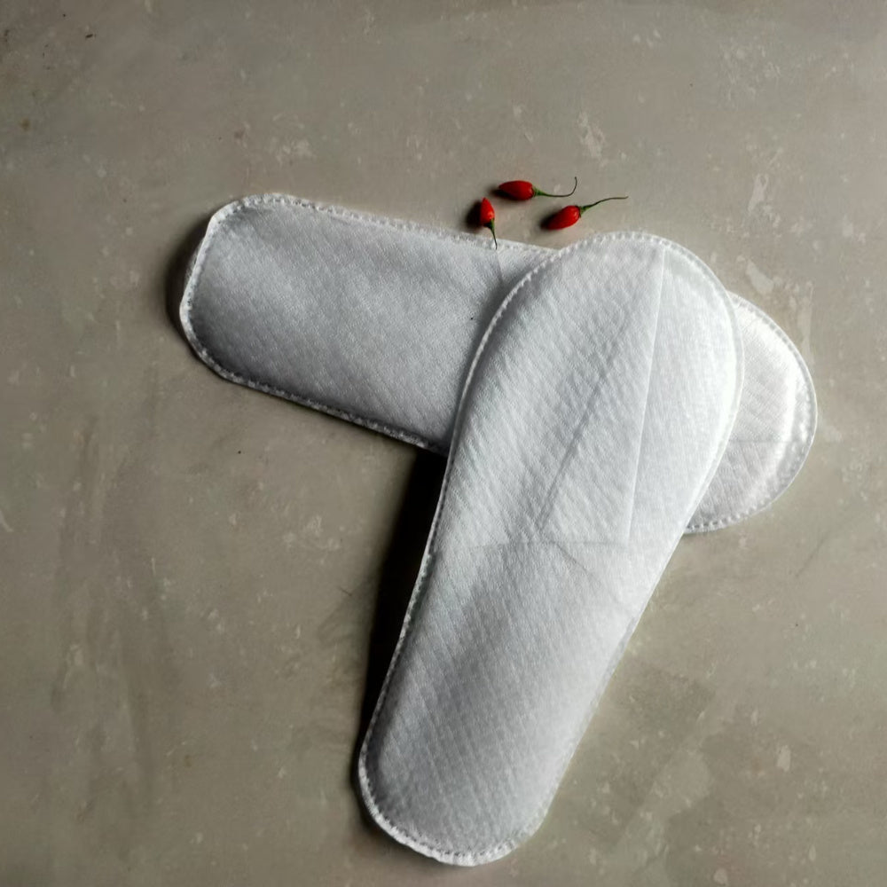 Paquete de 10 zapatillas desechables de fibra no tejida para huéspedes de hoteles y spas