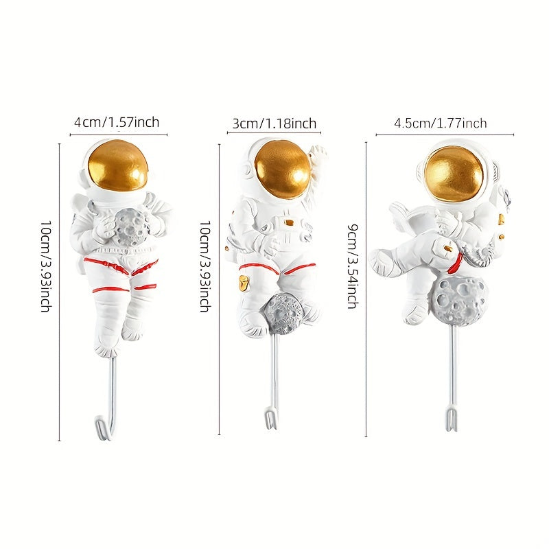 Ganchos de pared para cocina y puerta con diseño de astronauta adhesivo, fuerte y sin daños