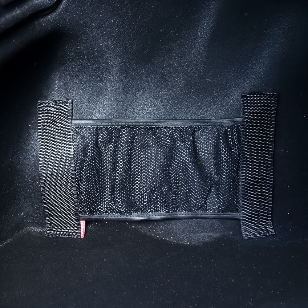 Mustahkam naylon to'radan yasalgan avtomobil yukxonasini tashkil etuvchi, orqa o'rindiq orqasida osiladigan yuk cho'ntagi bilan. Elektr energiyasi talab qilinmaydi. Qora rang. Uy va garajni tartibga solish uchun ajoyib.