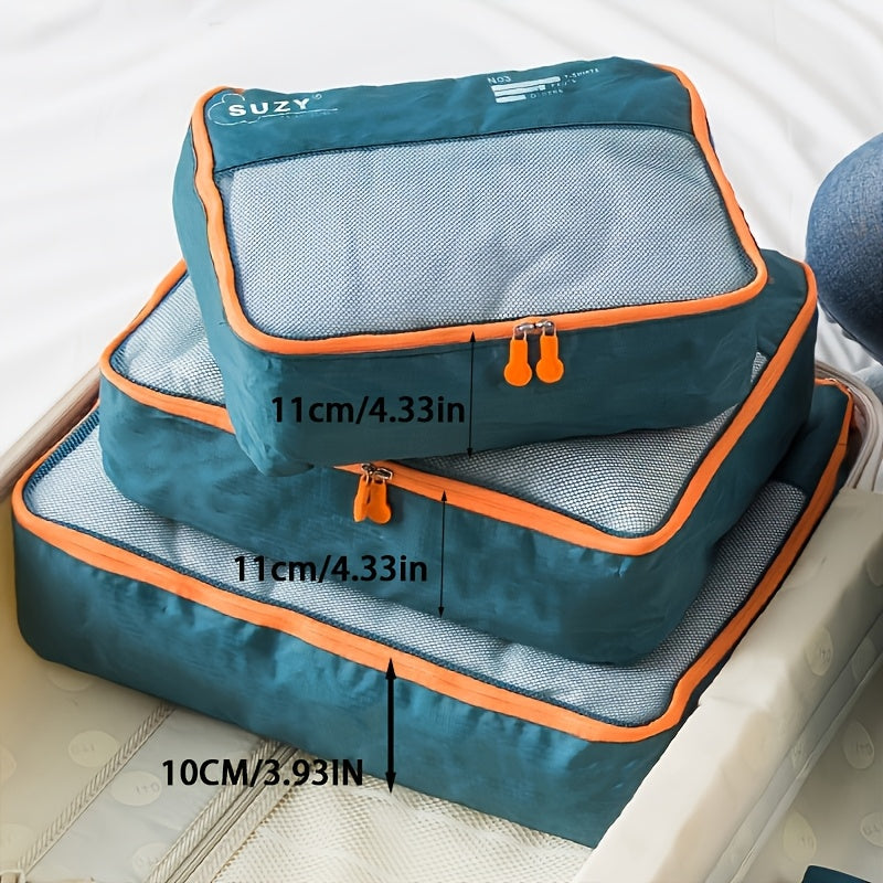 7-Piece Navy Blue Polyester Packing Cubes with Orange Accents for Travel Luggage Storage