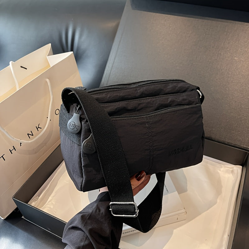 Стильная нейлоновая сумка через плечо для женщин: просторная, легкая, универсального однотонного цвета с застежкой на молнии, идеальна для повседневного использования. Доступна в цветах хаки/черный.