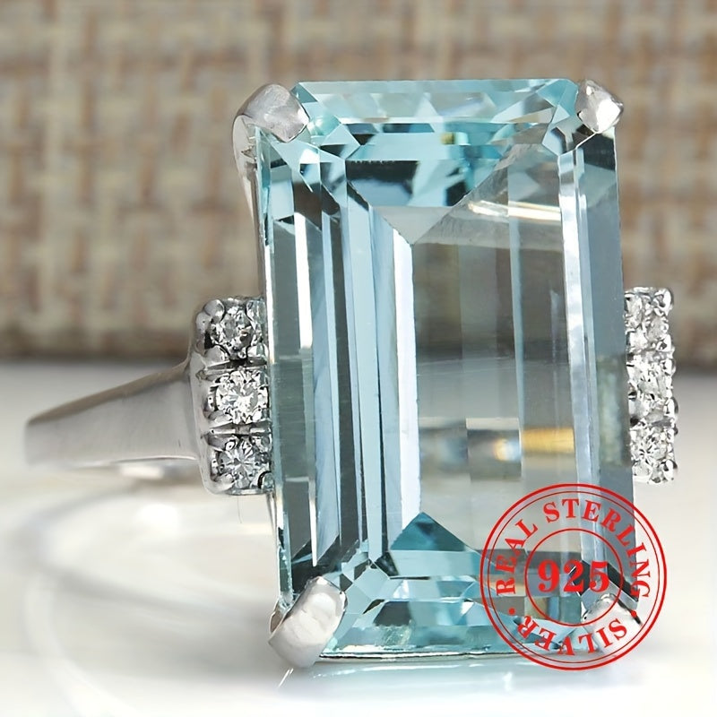 Sterling Silver Ring with Synthetic Aquamarine March Birthstone 4-Prong Setting