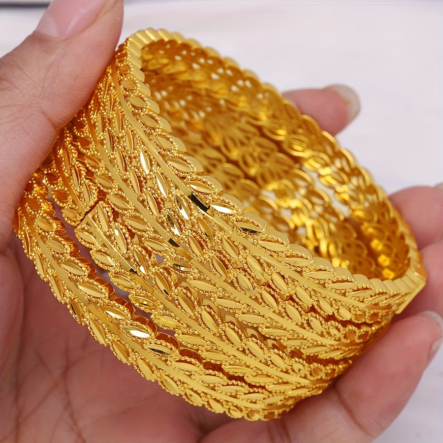 "Maqsadli tadbirlar va qo'l aksessuarlari uchun 4 ta oltin barg naqshli bilaguzuklardan iborat hashamatli etnik uslubdagi mis zargarlik to'plami."