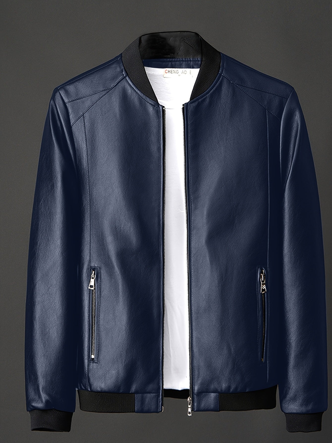 Erkaklar uchun amerika uslubidagi toraytiruvchi jaket, beysbol yaka va metall zip tafsilotlari bilan, tasodifiy va biznes kiyimlari uchun mos. Quvvat uchun mashinada yuvilishi mumkin, bahor va kuz uchun ideal.