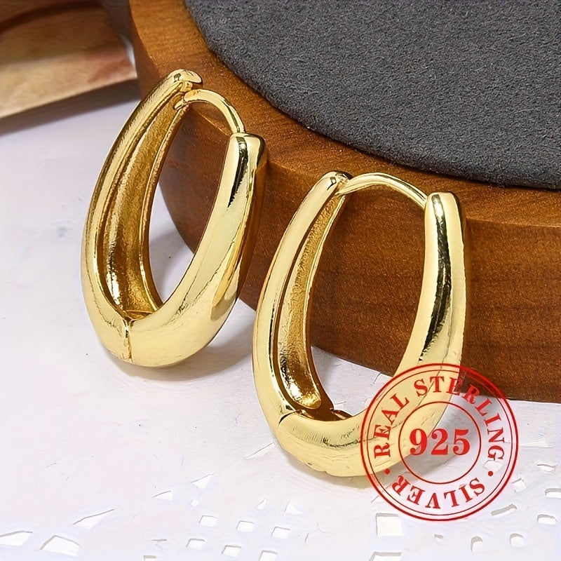 Серебряные серьги-кольца для женщин — элегантное универсальное украшение в подарок