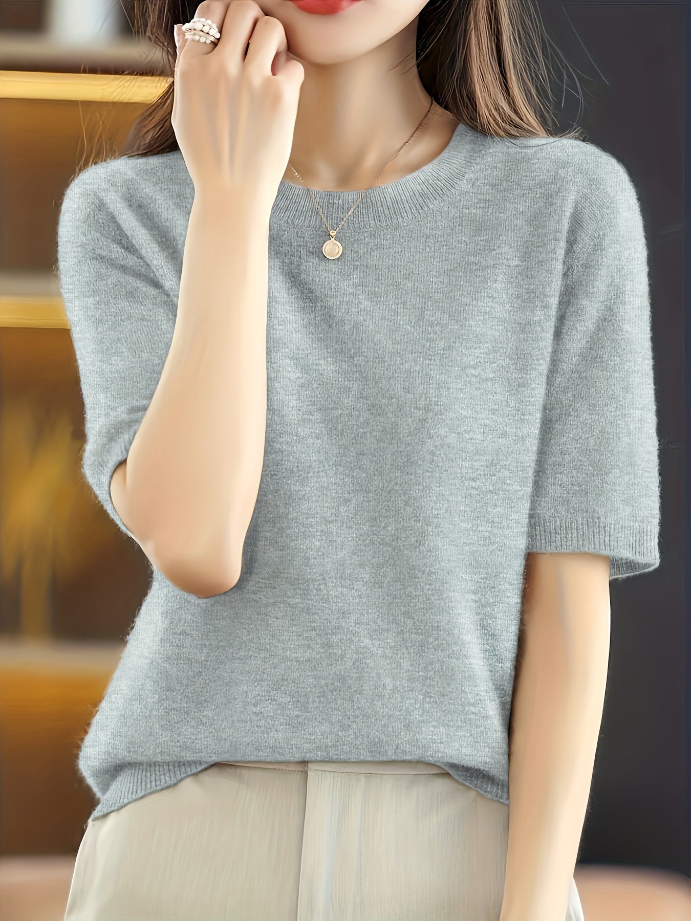 Suéter de manga corta de color sólido para mujer con cuello redondo para primavera y otoño