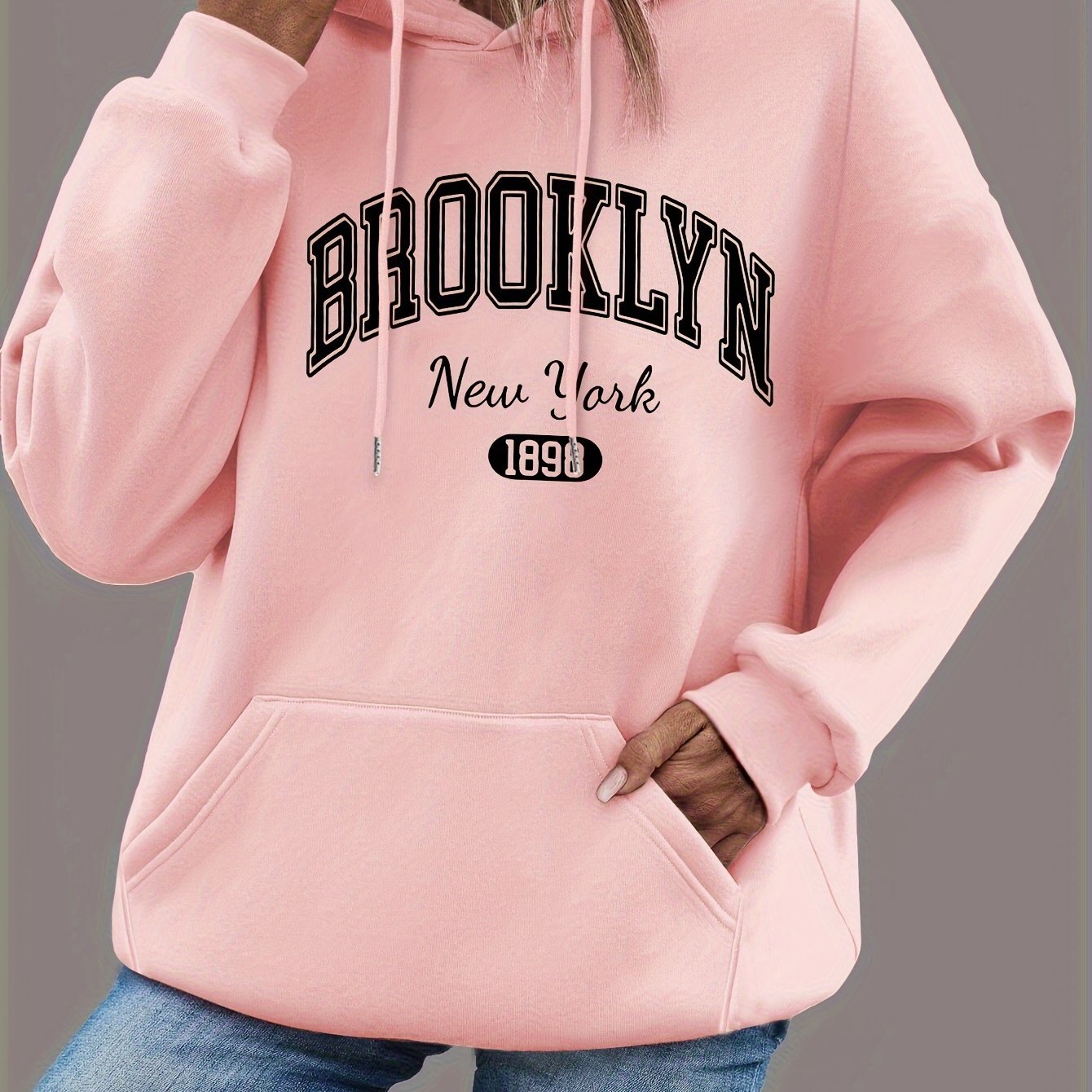 Sudadera con capucha de talla grande para mujer negra con bolsillos y estampado gráfico