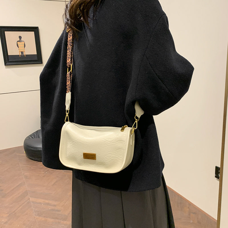 Women's Shoulder Bag with Adjustable Leopard Print Strap Zipper Closure Edge Paint Detail