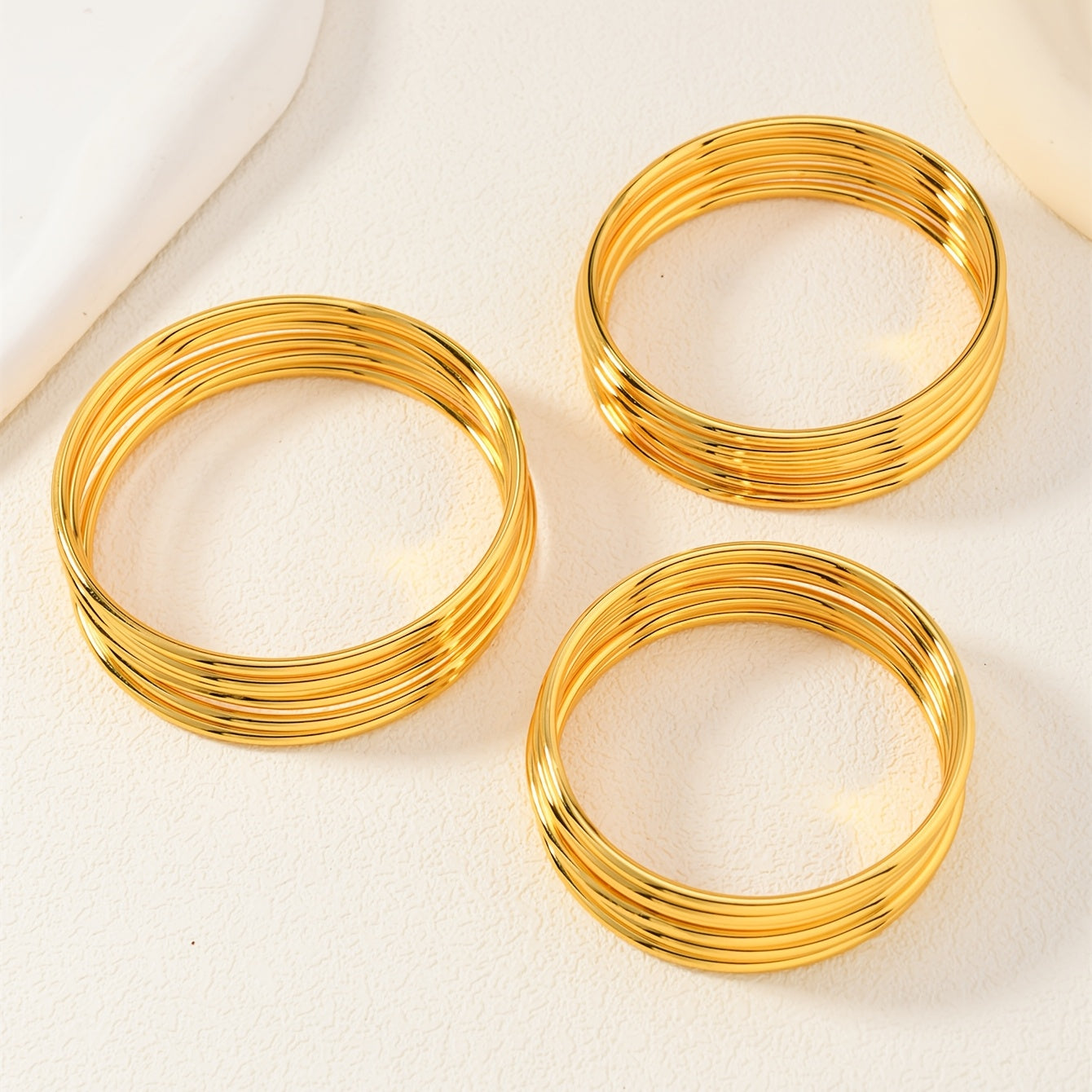 Set of 6 Gold-Plated Copper Bangles for Women Layered Shiny Jewelry for Weddings and Daily Wear