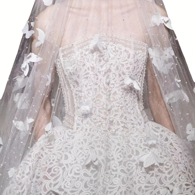 Velo de novia con perlas de imitación y detalles de mariposa para bodas
