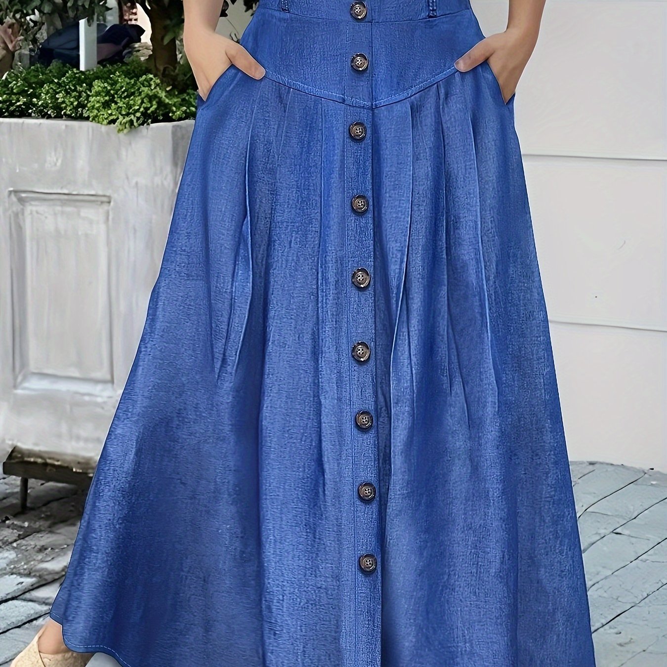 Falda de poliéster tejida de color sólido para mujer con doble bolsillo y botones en la parte delantera para primavera y verano