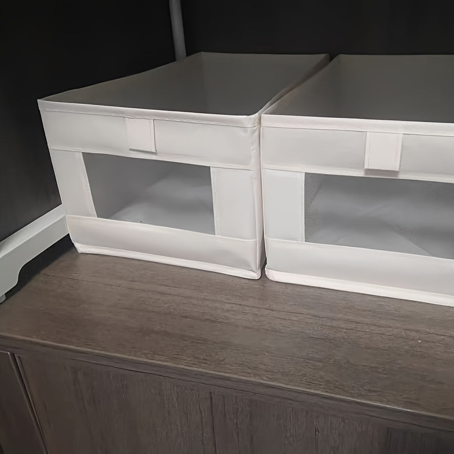 To‘g‘ri burchakli saqlash qutisi, to‘rli derazasi bilan, suv o‘tkazmaydigan Oksford matosidan tayyorlangan. Kiyim, ichki kiyim, yostiq va ko‘rpa to‘plashi uchun ideal. Uy, yotoqxona yoki talabalar yotoqxonasida joyni tejash uchun ajoyib.