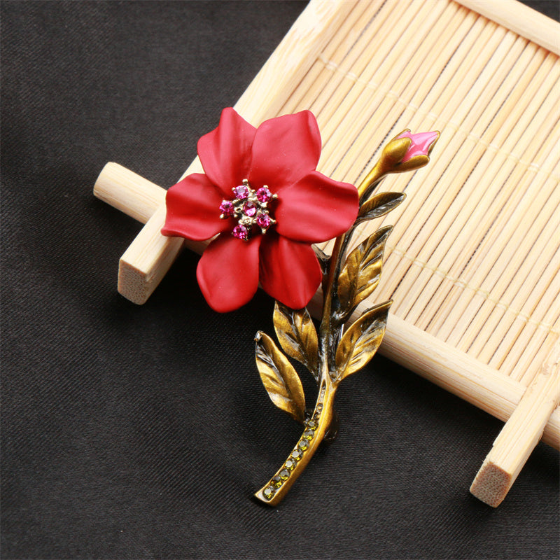 Elegant Red Enamel Floral Brooch Pin with Green Accent for Gifts and Celebrations