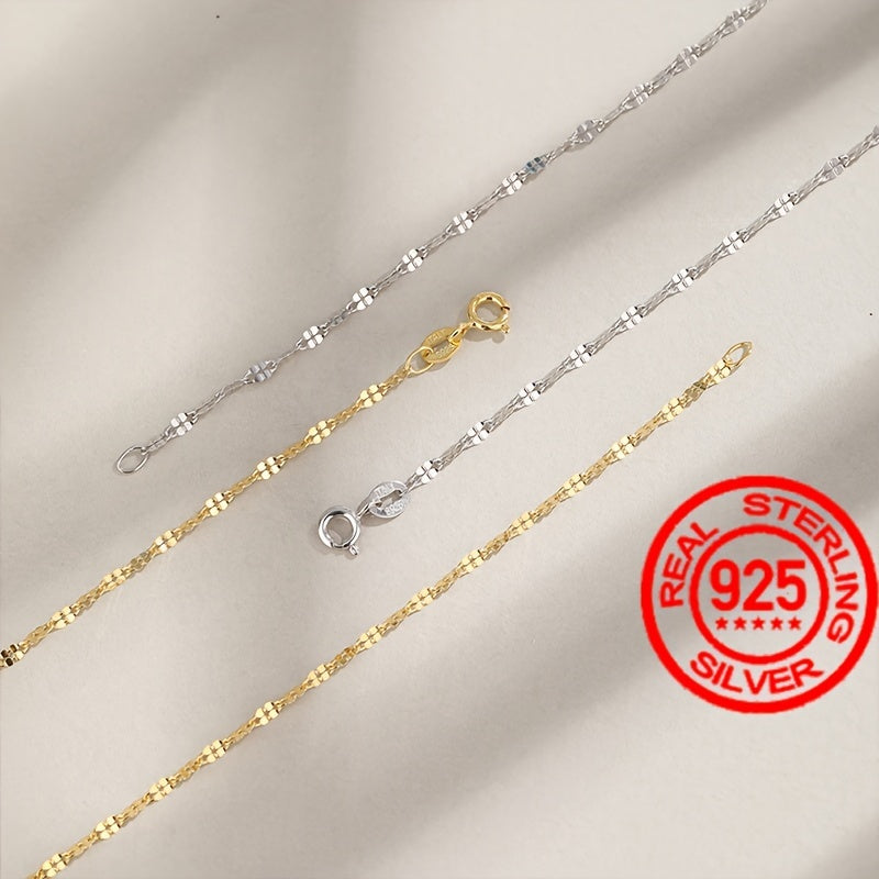 S925 kumush marjon, yapon va koreys uslubida, oddiy va nafis lab pendanti bilan bezatilgan. Ushbu yengil hashamatli kalviks zanjiri yuqori darajadagi uslub hissini tarqatadi. Chiroyli kumush rangdagi nozik va oddiy zanjir dizayni, og'irligi 1.6g.