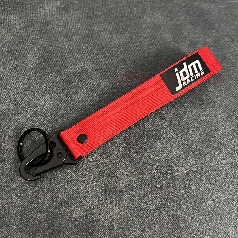 Issiq avtomobil kaliti zanjiri naylon tarmoq bilan ko‘k lentalik emblema kaliti bilan po‘lat klip bilan