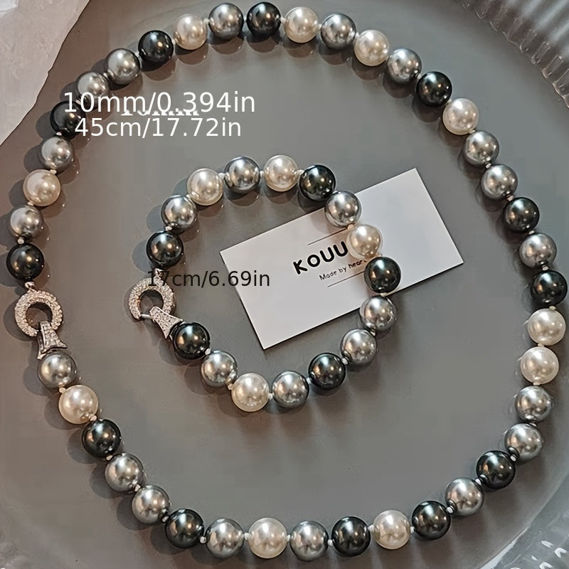 Vintage marvarid bilaguzuk va taqinchoq to'plami 10mm ikki qismli dizaynga ega. Ushbu ko'p maqsadli bo'yin zanjiri aralash ranglarda mavjud bo'lib, 14-fevralda sovg'a berish yoki kundalik kiyish uchun juda mos keladi. Ayollar uchun ideal.