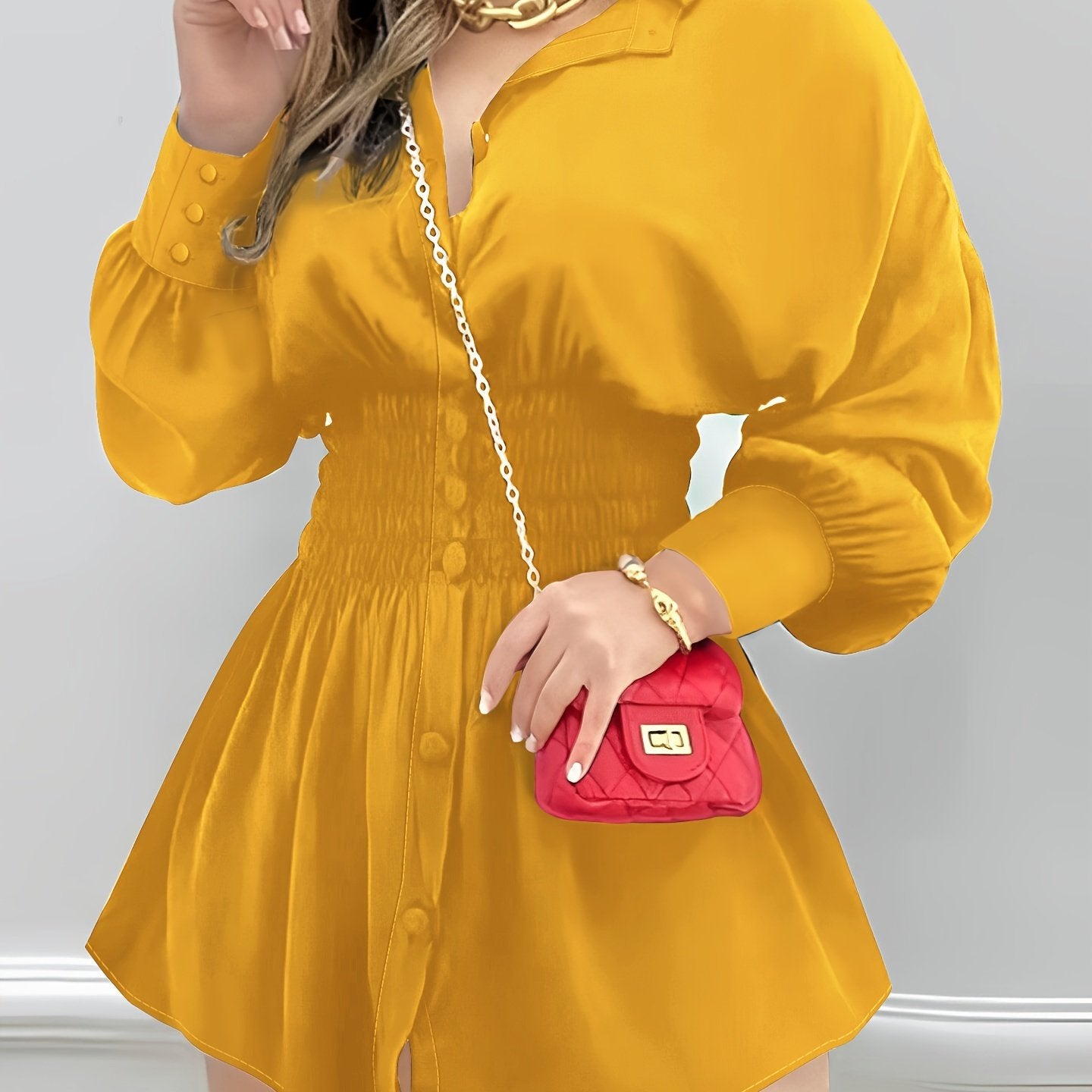 Блузка с длинными рукавами и лацканом, с застежкой на пуговицы и эластичным поясом.