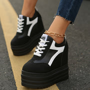 Women's Lightweight Solid Color Low-Top Canvas Sneakers with Lace-Up Closure