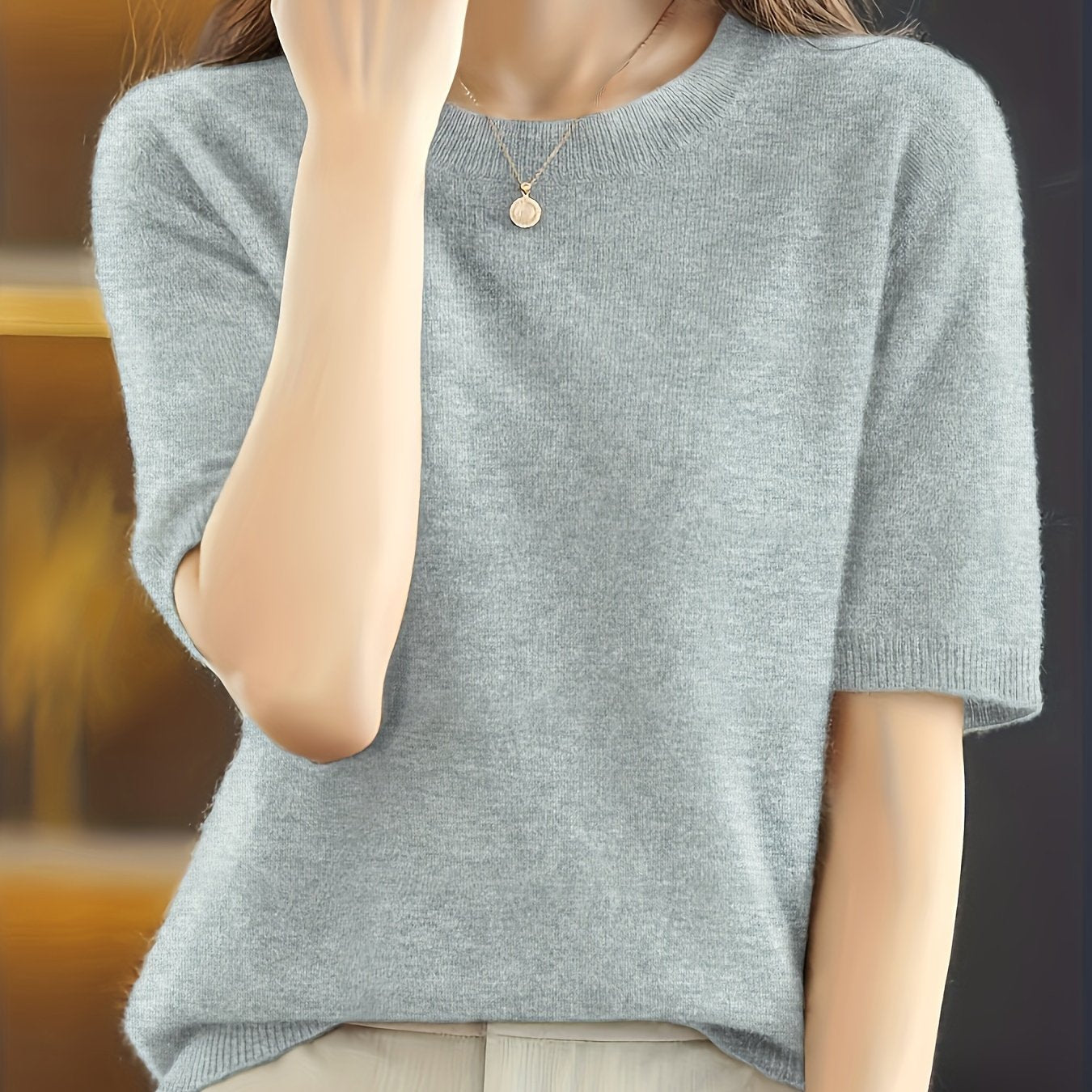 Suéter de manga corta de color sólido para mujer con cuello redondo para primavera y otoño