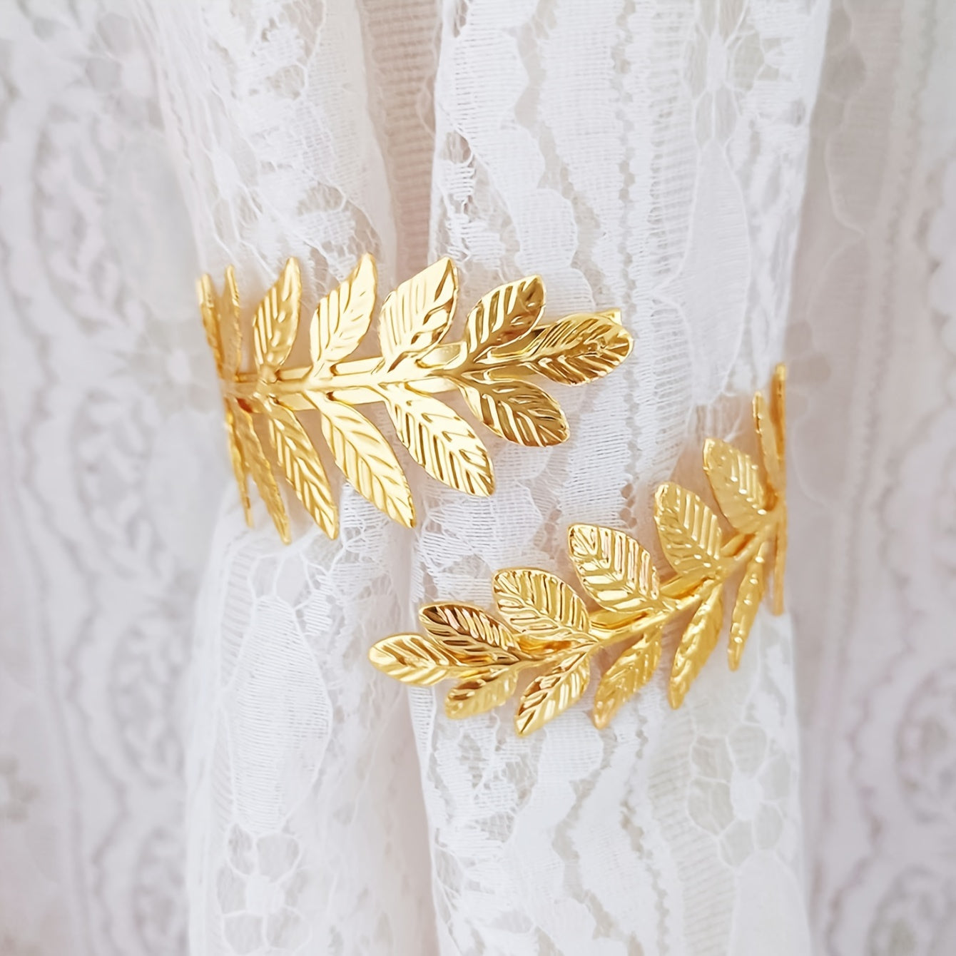 Decorative Curtain Tieback with Gold Accents and Leaf-Shaped Hooks