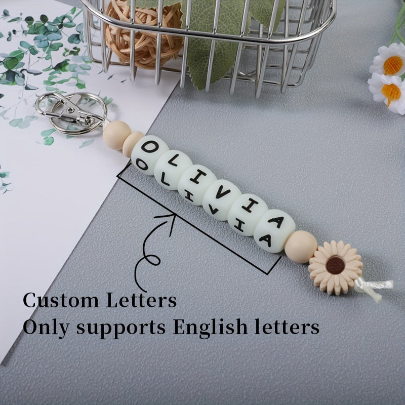 Индивидуальный силиконовый брелок с светящимися в темноте буквами и подвеской в виде цветка для сумок и рюкзаков