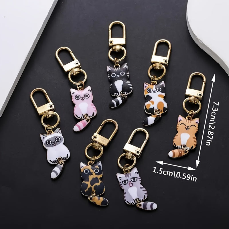 Set of 7 Zinc Alloy Cat Tail Keychains with Movable Tails for Bags and Zippers