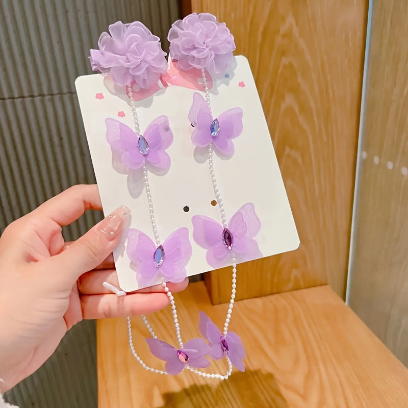 Yoshlar uchun yangi to'plam 2 qizning soch qisqichlari, kapalakga o'xshash marvaridlar, yoqimli to'r ip gullari, uzun marjonli tassel va o'ralgan soch zanjiri.