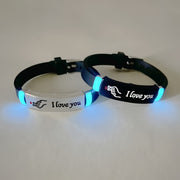 Pair of 2 Glow-in-the-Dark Silicone Couple Bracelets with Hand Heart Gesture