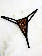 Panties tanga de tiro bajo para mujer, transpirable, mezcla de nylon, detalle cruzado, lencería semi-transparente