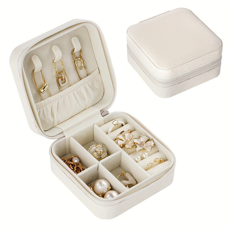 1. Klassik sun'iy charmli zargarlik qutisi, marjon osgichlari, fermuar yopilishi va mato astari bilan. 
2. Tekstural qoplama va sayohat uchun ideal portativ dizayn. 
3. Zargarlik buyumlari uchun ko'p maqsadli saqlash.