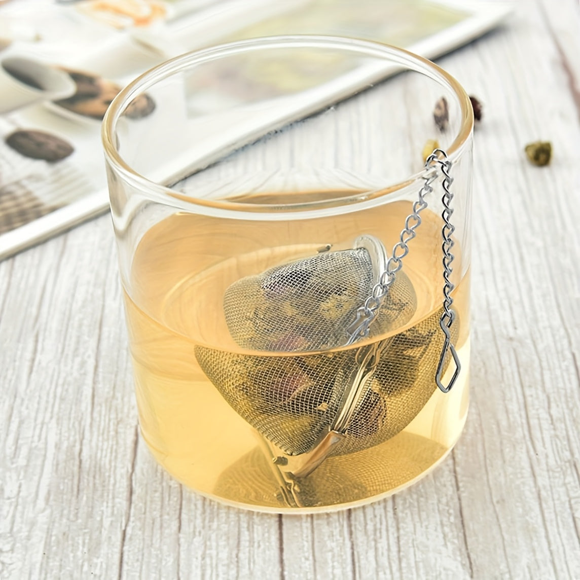 Infusor de té de acero inoxidable en forma de corazón con malla y cadena de extracción