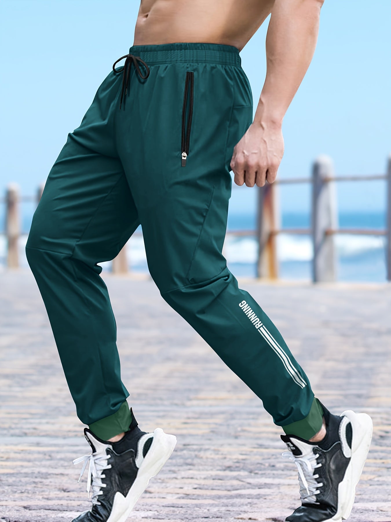 Pantalones deportivos de poliéster para hombre, que absorben la humedad, de corte holgado y secado rápido para correr, yoga y entrenamiento