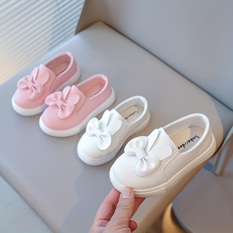 Qizlar uchun bowknot tafsiloti bilan oq loferlar, yumshoq taglik, kiyish uchun qulay uslub. Maktab, norasmiy, kollej va dam olish kiyimlari uchun mos, barcha fasllar uchun mukammal.