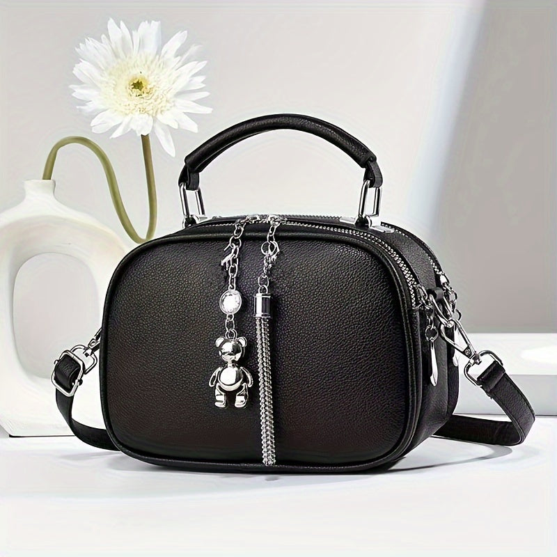 Black Mini Crossbody Bag with Bear Tassel and Multiple Compartments