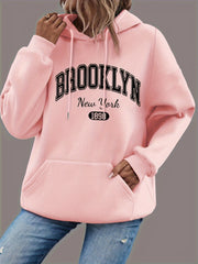 Sudadera con capucha de talla grande para mujer negra con bolsillos y estampado gráfico