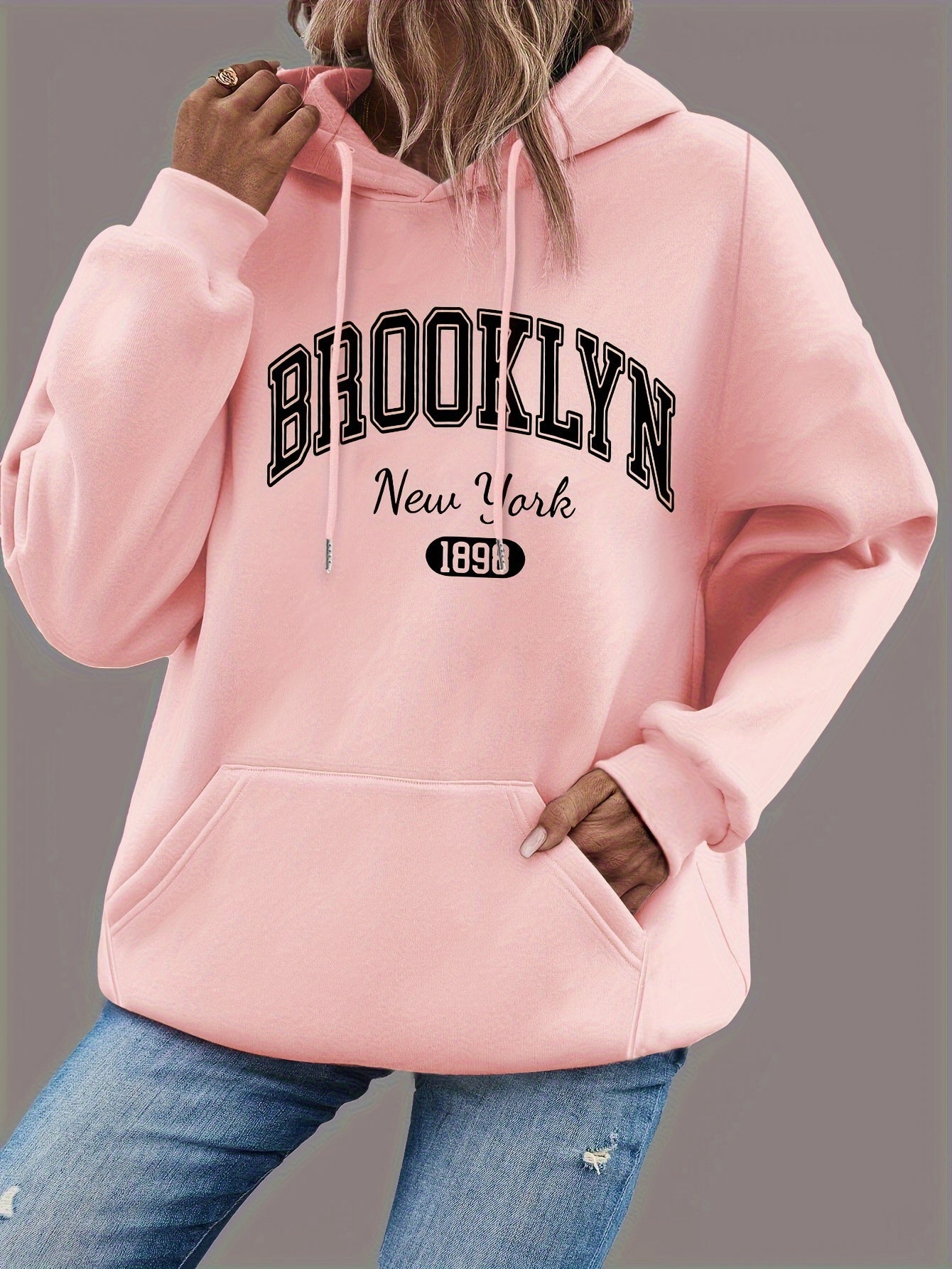 Sudadera con capucha de talla grande para mujer negra con bolsillos y estampado gráfico