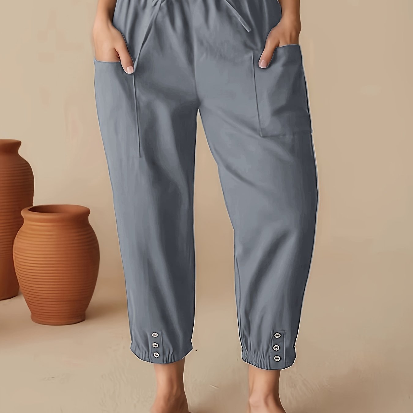 Pantalones casual de cintura alta y corte cropped para mujer con bolsillos azul marino