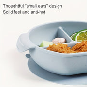 Ushbu ovqat idishi oziq-ovqat darajasidagi silikondan tayyorlangan bo'lib, o'rgatish va stol anjomlari uchun ideal hisoblanadi. U BPA dan xoli va mikroto'lqinli pechda, idish-tovoq yuvish mashinasida va pechda xavfsiz ishlatilishi mumkin.