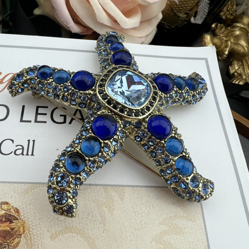Vintage Oceanic Starfish Brooch with Rhinestones and Baroque Style
